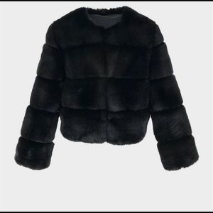 Black paneled fur coat